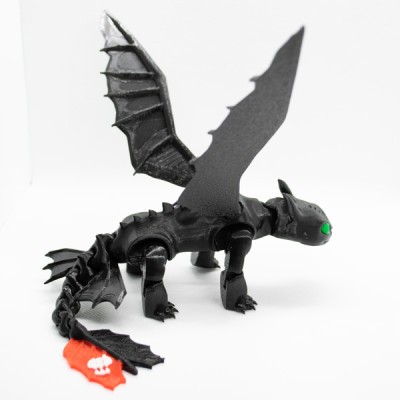 Дракон з мультика "Як приборкати дракона" Беззубик Дракон з мультика "Як приборкати дракона" Беззубик